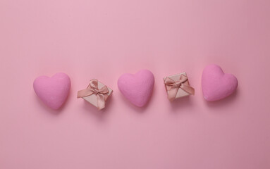 Poster - Gift boxes with hearts on a pink background. Love concept. Top view