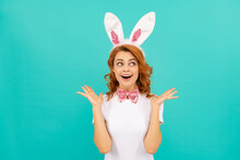 Happy Amazed Easter Girl In Bunny Ears And Bow Tie On Blue Background