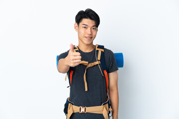 Wall Mural - Mountaineer Chinese man with isolated on white background with thumbs up because something good has happened