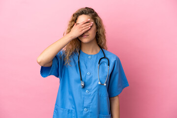 Wall Mural - Young surgeon doctor woman isolated on pink background covering eyes by hands. Do not want to see something