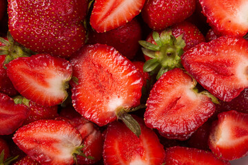 Wall Mural - Fresh sliced strawberries for jam or pie filling, close-up, top view