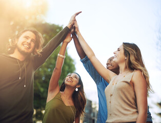 Aufkleber - The strength of the youth. Shot of a group of young friends giving each other a high five.