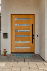 Wall Mural - Light brown wooden door with modern design