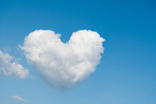 White Heart Shaped Cloud In The Blue Sky