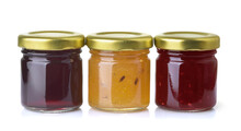 Front View Of Three Different Jam Jars