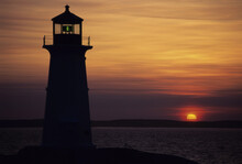 Sunset At Peggy's Cove Lighthouse, Peggy's Cove, Nova Scotia, Canada