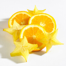 Close-up Of Starfruit And Orange Slices
