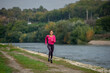 © qunica.com - Running by the river alone