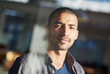 Poster - Business needs Ill take care of it. Portrait of a young businessman standing in his office.