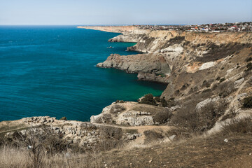 Sticker - View of Crimean rugged rocky with Diana's Grotto and beach from top of the cliff on Fiolent Cape. Sevastopol. Crimea