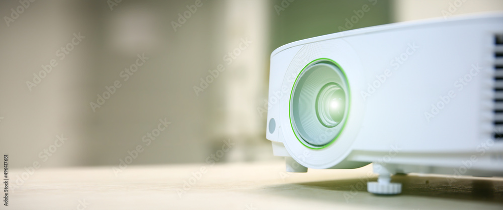 Close-up computer projector on table boardroom or meeting room ...