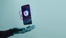 Cyber Security Technology Concept. Securing Cloud Online Web Systems. Hand Levitating Smart Phone With Padlock, Fingerprint And Protect Guard Shield. Web3 And Privacy.