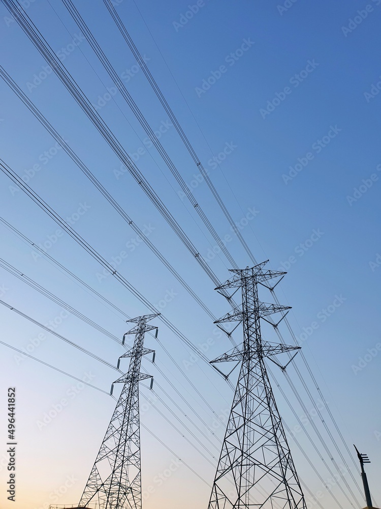 Electric tower on blue sky and clounds as a background, High voltage ...