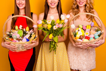 Poster - Cropped photo of three funny ladies hold easter baskets bunch family gathering tradition wear fancy dress isolated yellow background