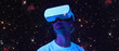 © nuclear_lily - Man is using virtual reality headset. Elements of this image furnished by NASA.