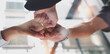 © NAMPIX - Group of people hand together brainstorming, meeting Team discussing roadmap to product strategy, new business success concept.