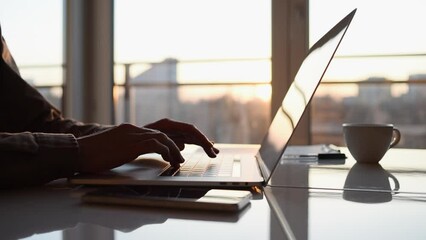 Businessman using laptop computer in office. Young man entrepreneur working at home. Online learning, internet marketing, business studying, working from home, education, web conferencing concept