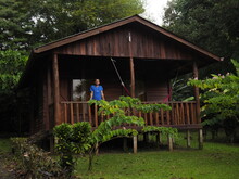 Young Man In A Wooden House In The Jungle Of Costa Rica