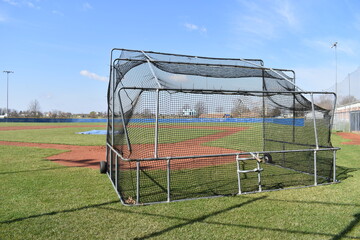 Wall Mural - Batting Cage on a Baseball Field