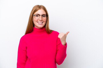 Poster - Young redhead woman isolated on white background pointing to the side to present a product