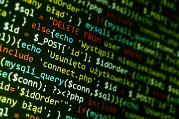 Wall Mural - software development pattern. programmer monitor with php language code. closeup tablet screen techn