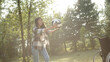 © iaginzburg - A young pretty couple decide playing volleyball in the public park in good weather