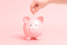 Piggy Bank On Pink Background, Budgeting Concept