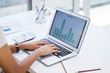Poster - Taking the day to attend to my finances. Shot of a businesswoman using her laptop to compile spreadsheets.