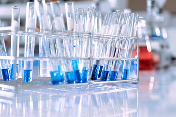 Wall Mural - glass flask in chemical science education laboratory with molecular structure in blue background