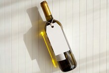 Hang Tag Mockup For Design Or Text Presentation, Tag Label With String Hanging On Wine Bottle, Wedding Favor Tag Template.
