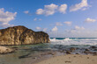 Windy and Rocky Coastline of the Mediterranean Sea in the Marsa Matruh city under Blue Cloudy sky with no People around, Egypt