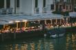 Venice, Italy - May 25, 2019: view of restaurant at city quay summer time