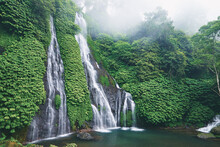 Tropical waterfall in jungle. Bali, Indonesia.