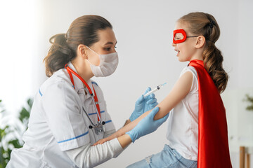 Wall Mural - Doctor vaccinating child