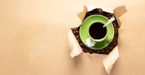 Poster - Cup of coffee and beans in torn paper. Coffee with espresso in cardboard background