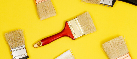 Paint brush on pink background, how to choose the perfect home paint color and good for health