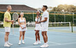 © Siphosethu Fanti/peopleimages.com - Listen to your coach. Full length shot of a handsome mature male tennis coach talking to his students out on the court.