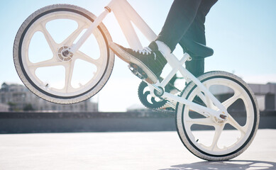 Wall Mural - Trickin. Cropped shot of an unrecognizable man riding his BMX outside.