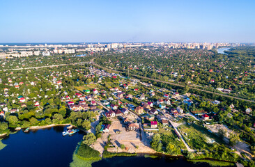 Poster - Aerial view of houses at the Dnieper riverside in Kiev, the capital of Ukraine before the war with Russia