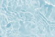 de-focused.Closeup of blue transparent clear calm water surface texture with splashes and bubbles. Trendy abstract summer nature background. for a product, advertising, text space