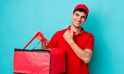 Poster - handsome hispanic man feeling happy and facing a challenge or celebrating. delivery pizza concept