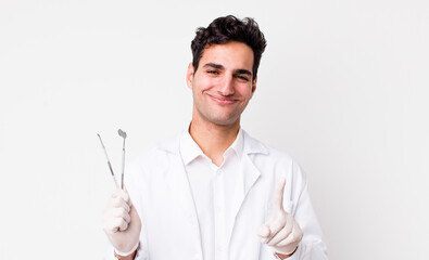 Poster - handsome hispanic man smiling proudly and confidently making number one. dentist concept