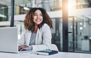 Aufkleber - Shes got an ambitious mind. Shot of a young businesswoman working on a laptop in an office.