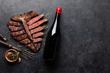 Wall Mural - Grilled porterhouse beef steak. Sliced T-bone