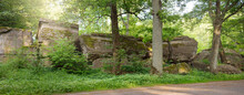 An Old Abandoned Stone Military Pillbox (guard Post) In The Middle Of The Green Summer Forest. Europe. Landmarks, Architecture. History, Past, War, Conflict, Fortification, Protection. Panoramic View