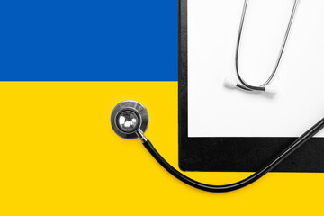 Stethoscope on the national flag of Ukraine blue and yellow