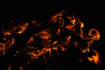 Wall Mural - Beautiful shot of the fire on dark background