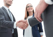 © ASDF - Business shaking hands in the office
