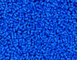 3D rendered blue background of a PVC plastic granules background