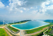 © AmazingAerialAgency - Aerial view of wind turbine and artificial lake, Mount Gilboa, Israel.